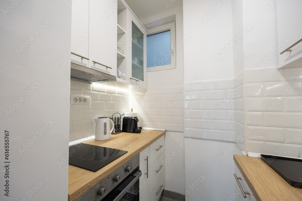 Fototapeta premium Small kitchen interior with appliances