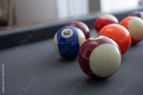 A view of pool balls on the right side of the frame.