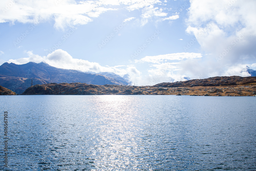 Natural landscape alpine lake and mountain in sunny day