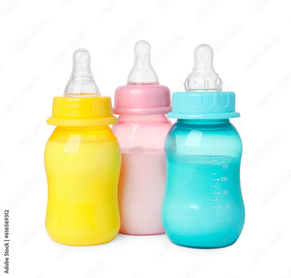 Feeding bottles with milk on white background Feeding bottles with milk on white background