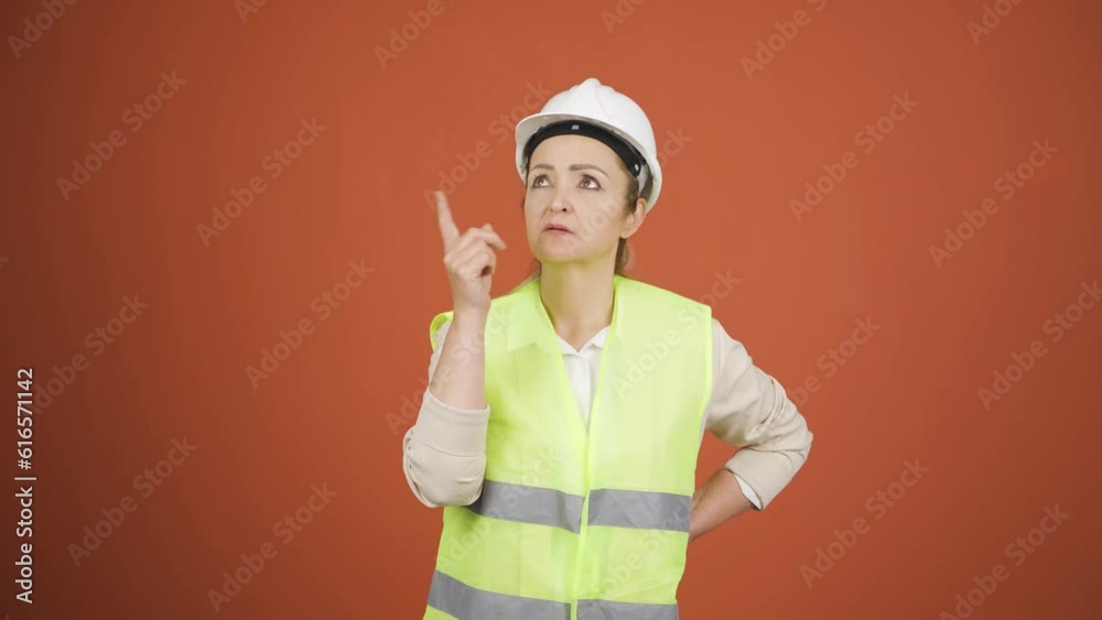 The engineer watching the construction is thoughtful. The engineer watching the construction is thoughtful.