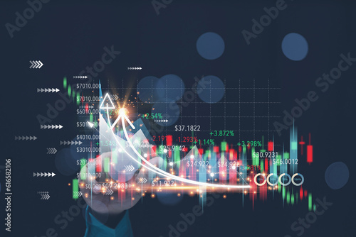 A man touching on the virtual screen at growth graph for analyzing market stock to investment and trading of stocks for profit to corporate. Strategy, analysis marketing of stocks concept.