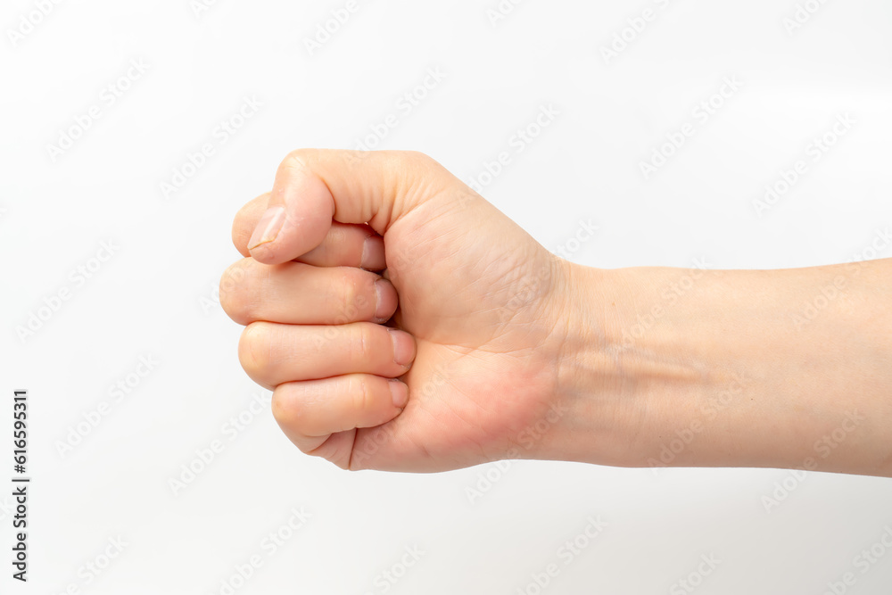 Close-up of beautiful woman's hand isolated on white background. Close-up of beautiful woman's hand isolated on white background.