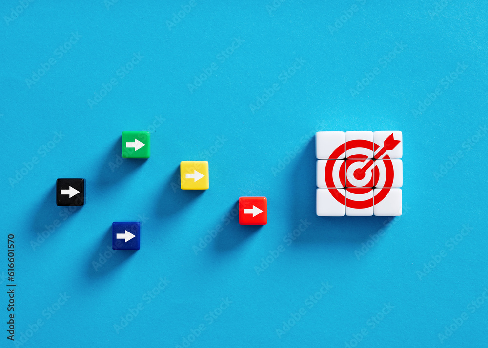 © Cagkan - Competition to achieve business goals. Goal setting, performance and strategy. Colorful cubes with target goal and arrow symbols. © Cagkan - Competition to achieve business goals. Goal setting, performance and strategy. Colorful cubes with target goal and arrow symbols.