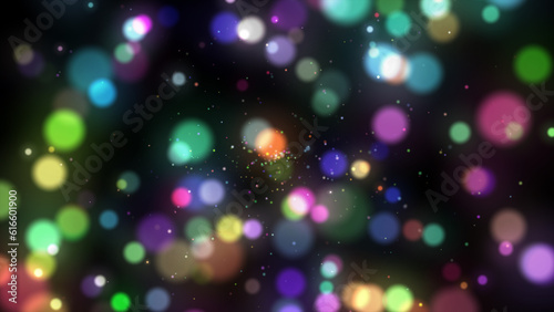 Abstract background with multicolored bokeh lights.