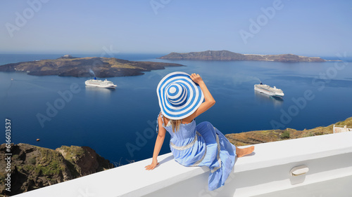 Happy in summer with young woman  leisure  as sunbating with mediterranean sea at Santorini island greece