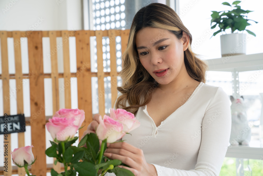 asian female hole roses in her hand asian female hole roses in her hand