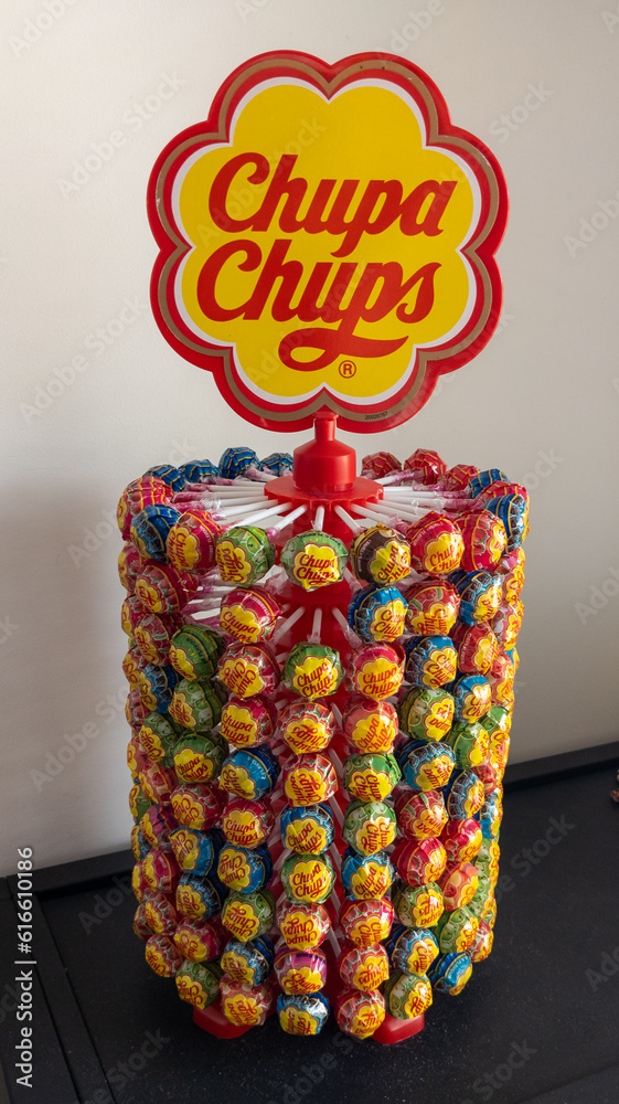 Chupa Chups logo text and brand sign on candy lollipop display ...