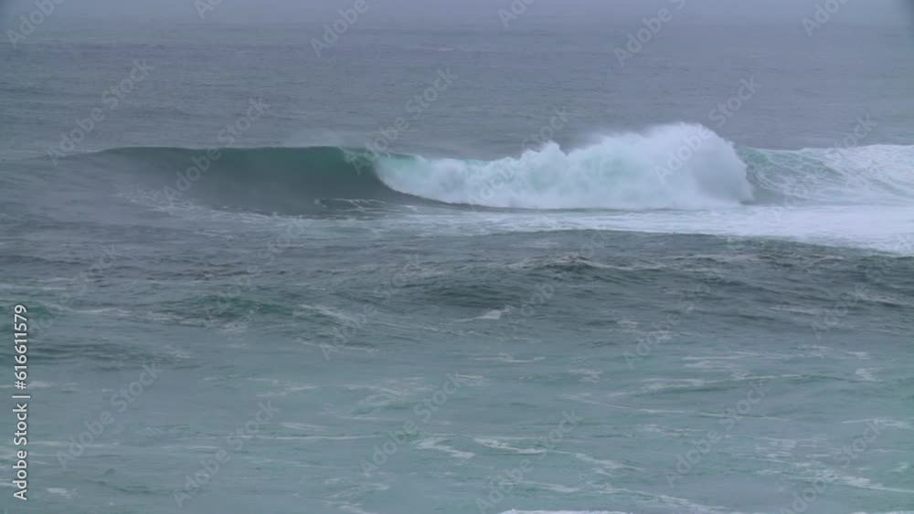 Slow Motion Panning Shot Of Large Waves Splashing Water In Sea - Oahu, Hawaii Slow Motion Panning Shot Of Large Waves Splashing Water In Sea - Oahu, Hawaii