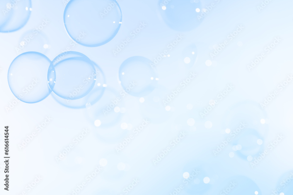 Beautiful Transparent Blue Soap Bubbles Floating in The Air. Abstract Blurred Background. Celebration Festive Backdrop. Freshness Soap Suds Bubbles Water