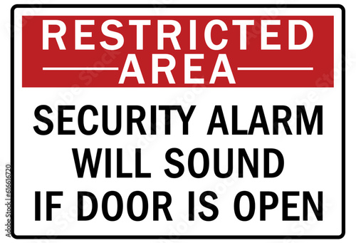 Restricted area warning sign and labels security alarm will sound if door is open