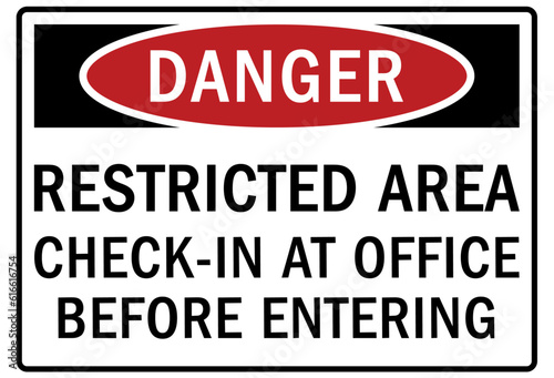 Restricted area warning sign and labels check in at office before entering photo