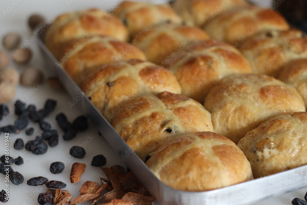 Hot cross buns. A sweet fruit bun lightly spiced with cinnamon and nutmeg and marked with a cross on top. Made to serve on Good Friday