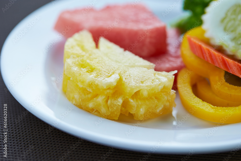 Tropical fruits and vegetables on a plate Tropical fruits and vegetables on a plate