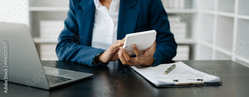 Real estate broker agent presenting and consult to customer to decision making sign insurance form agreement, home model, concerning mortgage loan offer