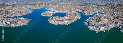 Panoramic aerial drone view above Sylvania Waters in the Sutherland Shire, Sydney, Australia on a sunny day in June 2023 