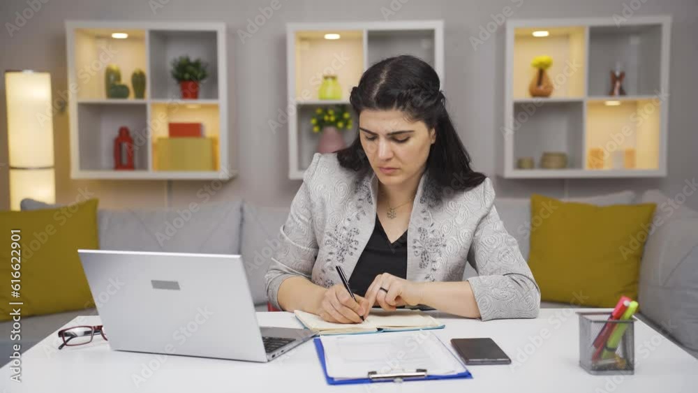 Home office worker woman doing research. Home office worker woman doing research.