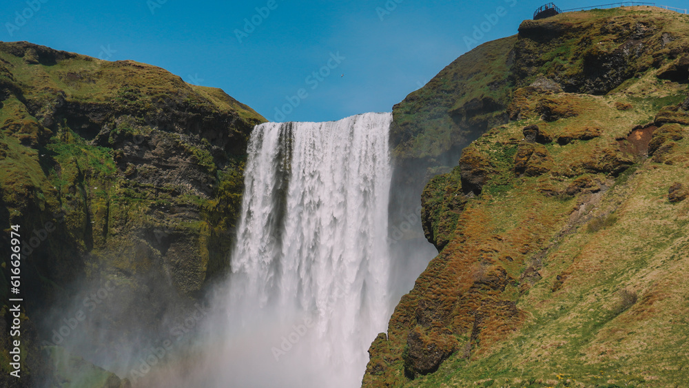 Obraz premium Waterfall In Iceland. Amazing View Of The Skogafoss Waterfall