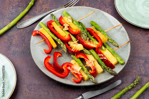 Vegetable skewers with asparagus and cheese.