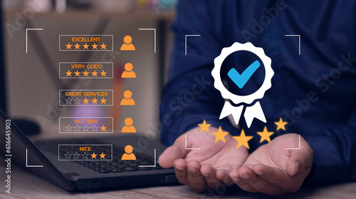 Quality Assurance and customer satisfaction Rating survey concept, Businessman show the assurance icon in hand and customer review rating survey of customer comment feedback review good quality