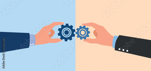 Two hands holding and connecting a gear tools, team work concept design