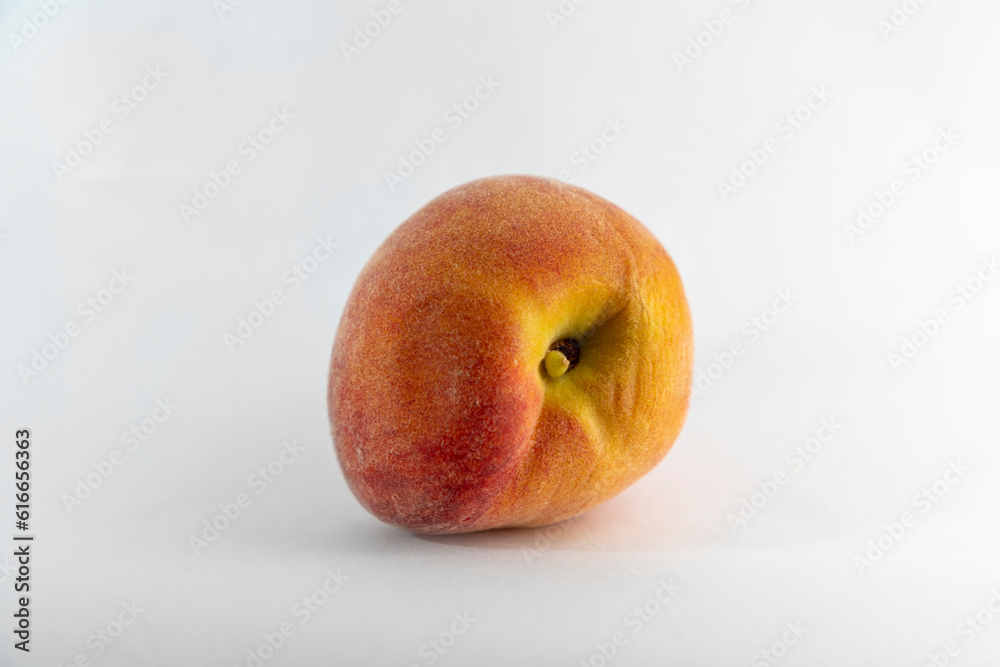 Ripe yellow peach fruit isolated on white background
Ripe yellow peach fruit isolated on white background