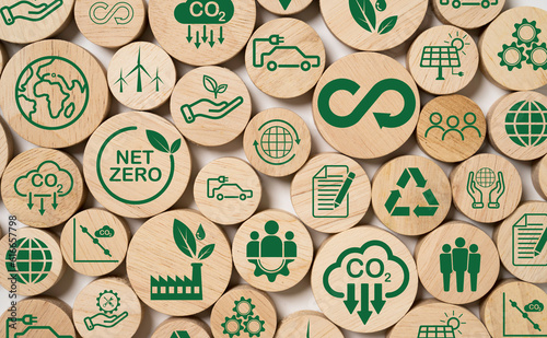 infinity and Circular business economy environment icons print screen on wooden for future sustainable investment growth and reduce environmental pollution concept. photo