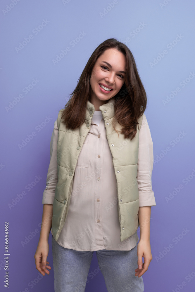 portrait of a European young woman with black hair below the shoulders in a casual look portrait of a European young woman with black hair below the shoulders in a casual look