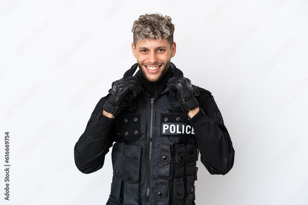 SWAT caucasian man isolated on white background smiling with a happy and pleasant expression SWAT caucasian man isolated on white background smiling with a happy and pleasant expression