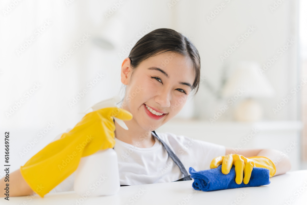 Close up view of person cleaning computer keyboard using tablecloth cleaning concept Close up view of person cleaning computer keyboard using tablecloth cleaning concept