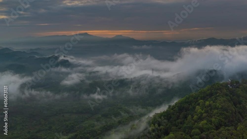 Wallpaper Mural 4K motion time lapse video aerial view morning scenery Mist flowing over the high mountains The movement of fog and clouds, Pang Puey, Mae Moh, Lampang, Thailand Torontodigital.ca