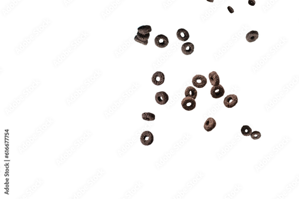 Chocolate rings cereal spill out into a bowl. Breakfast. Chocolate rings cereal spill out into a bowl. Breakfast.