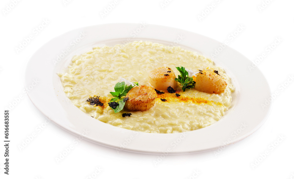 Scallops in sauce and white rice in a plate Scallops in sauce and white rice in a plate