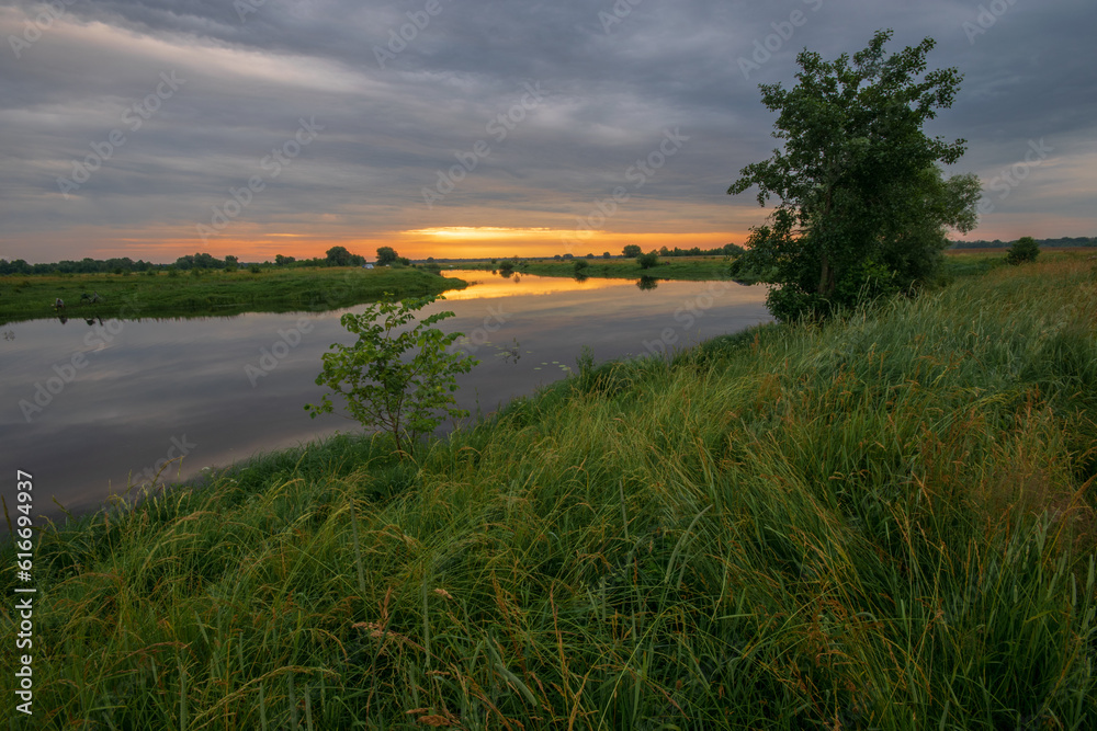 Fototapeta premium sunset over the river