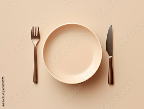 Empty plate, knife and fork on beige background, top view.AI Generated
