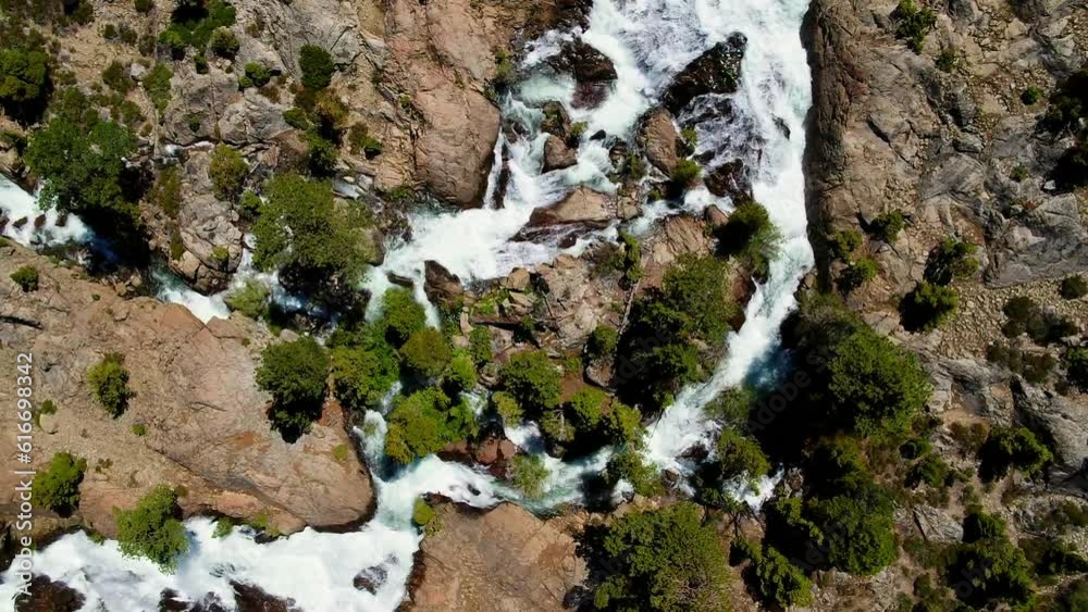 Aerial Top View Of Waterfall Amidst Trees On Mountain, Drone Flying Over Rocky Landscape - Mammoth Lakes, California Aerial Top View Of Waterfall Amidst Trees On Mountain, Drone Flying Over Rocky Landscape - Mammoth Lakes, California