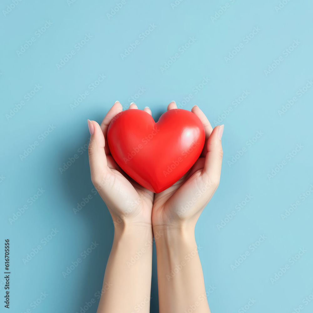 Red heart in man's hands isolated on blue background. Healthcare and hospital medical concept. Symbolic of Valentine day.Top view with space for text.Generative AI Red heart in man's hands isolated on blue background. Healthcare and hospital medical concept. Symbolic of Valentine day.Top view with space for text.Generative AI