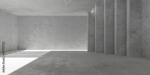 Abstract large, empty, modern concrete room with sunlight, stacked divider walls and rough floor - industrial interior background template