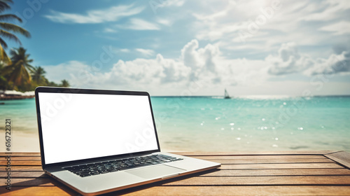 Laptop with cut out screen at sea resort. Remote work and business in palm paradise. Online purchase of air tickets and hotels. Copy space