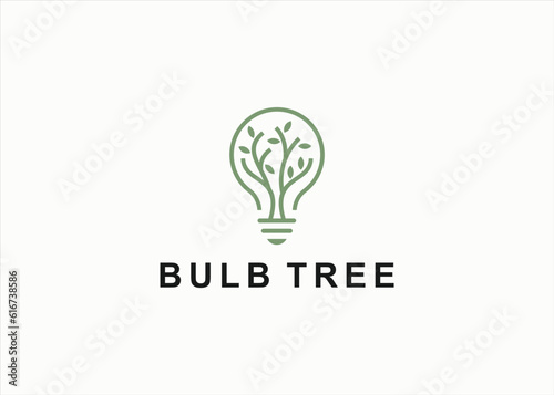 bulb with tree logo design vector silhouette illustration