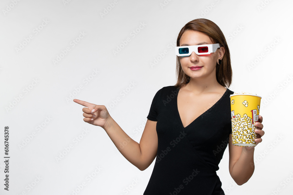 front view young female holding popcorn in d sunglasses on white background movies cinema film lonely
