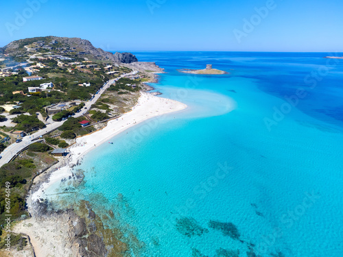 Fototapeta Naklejka Na Ścianę i Meble -  Aerial view of La Pelosa beach on a sunny day