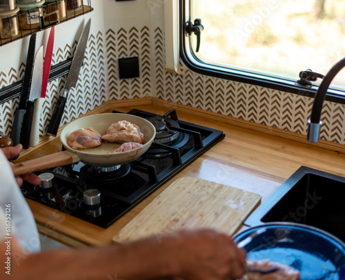 Wallpaper Mural older man cooking in his motorhome,The Pleasure of Cooking in Motion Torontodigital.ca