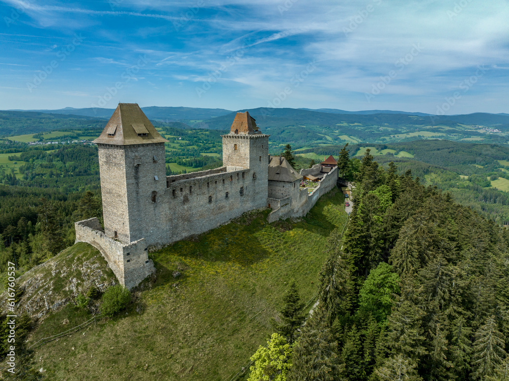Aerial view of Kasperk Hrad or Karlsberg castle in Czechia.  The central part of the castle consists of two residential towers and an oblong palace which was built between them