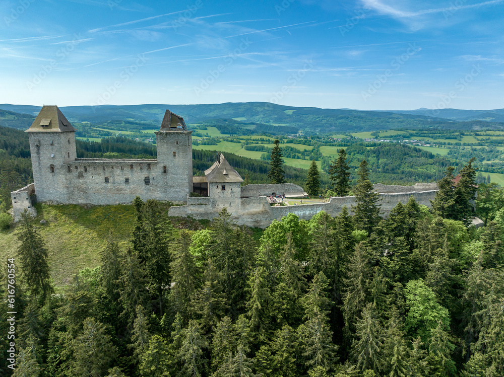 Aerial view of Kasperk Hrad or Karlsberg castle in Czechia.  The central part of the castle consists of two residential towers and an oblong palace which was built between them