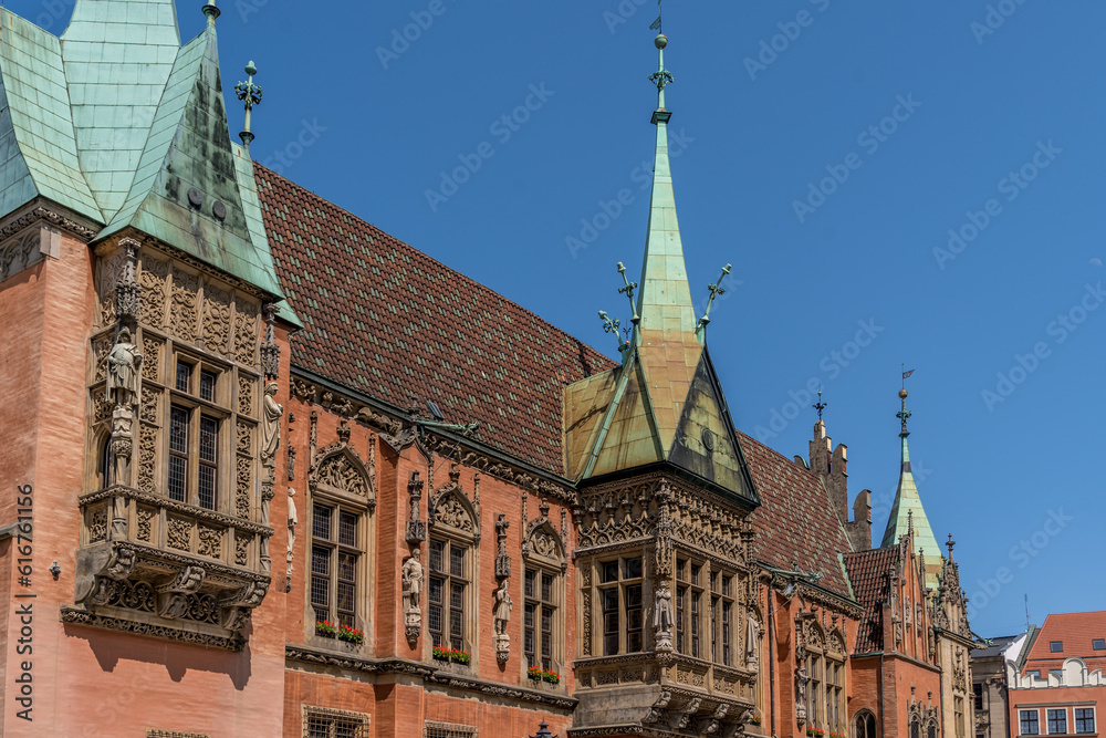 Gothic townhall with red brick walls in Wroclaq Breslau medieval town square