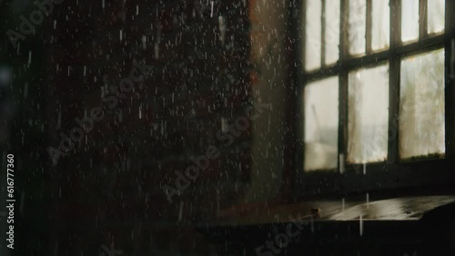Through the rain-kissed window, the night unveils an abstract cityscape, with wet streets reflecting the illuminated traffic in a mesmerizing blend of light and darkness.