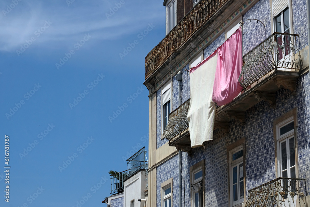 Sheets hanging out to dry in Lisbon, Portugal