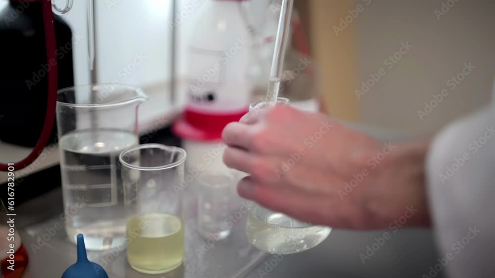 Witness the precise process of adding a chemical solution component ...
