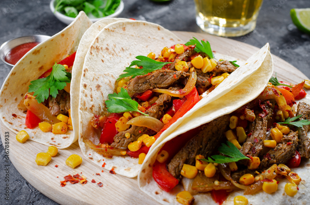 Mexican Tacos with Beef and Vegetables, Tacos al Pastor on Dark Background Mexican Tacos with Beef and Vegetables, Tacos al Pastor on Dark Background